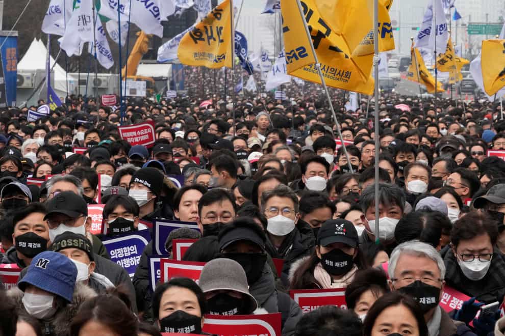 Doctors stage a rally against the government’s plans (Ahn Young-joon/AP)