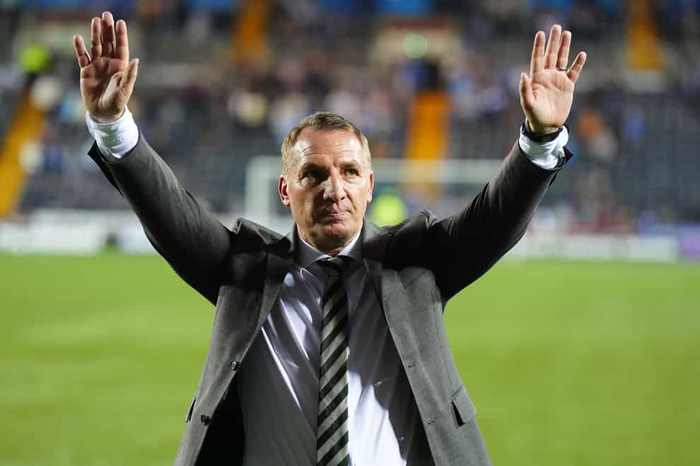 The Celtic manager celebrates after clinching the title (Jane Barlow/PA)