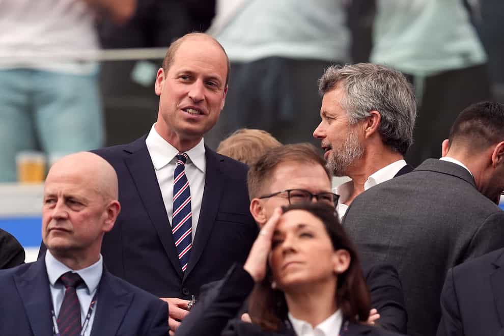 The Prince of Wales and King Frederik X of Denmark in the stands during the UEFA Euro 2024 match (Martin Rickett/PA)